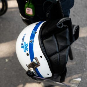 Detailed view of a police helmet with "Police" label, Montréal, Canada.